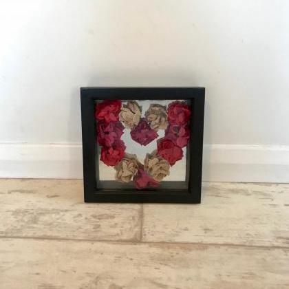 Heart shaped Red roses in a box fra..
