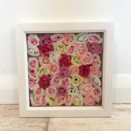 Box frame of pink and yellow flower..