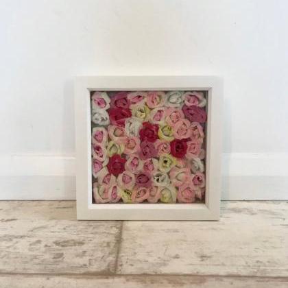 Box frame of pink and yellow flower..