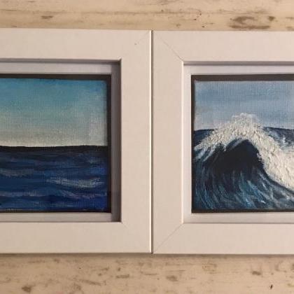Pair of framed painted sea views